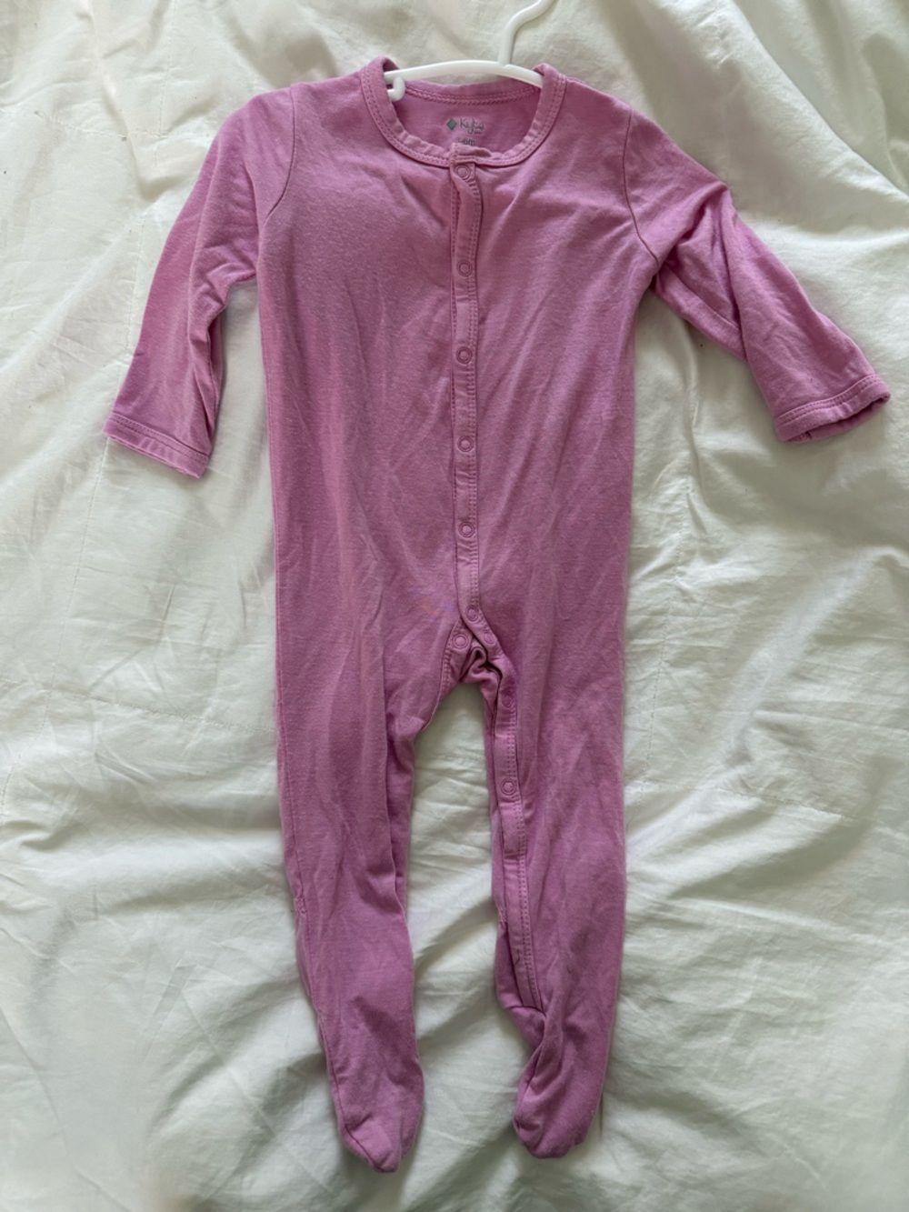 Kyte Baby pink snap sleeper.